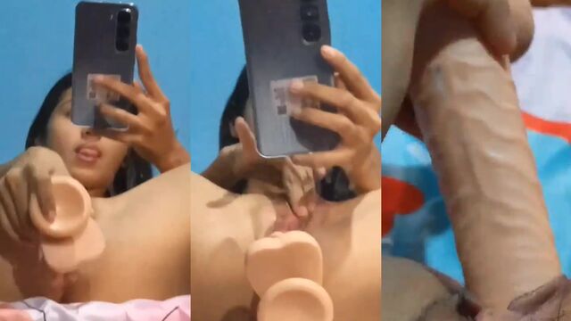 A cute chick plays with a toy while showing her tight hole LIVE