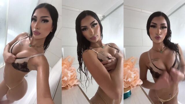 A petite Latina girl removes her clothes to demonstrate her slender figure