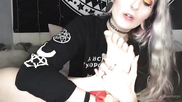Emo chick shows off her feet while giving a deepthroat blowjob