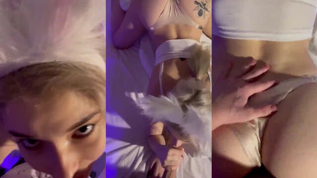 A bunny girl is giving a blowjob to her master