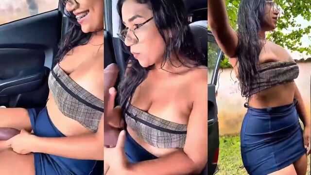 A hot brunette woman is showing herself off on the street