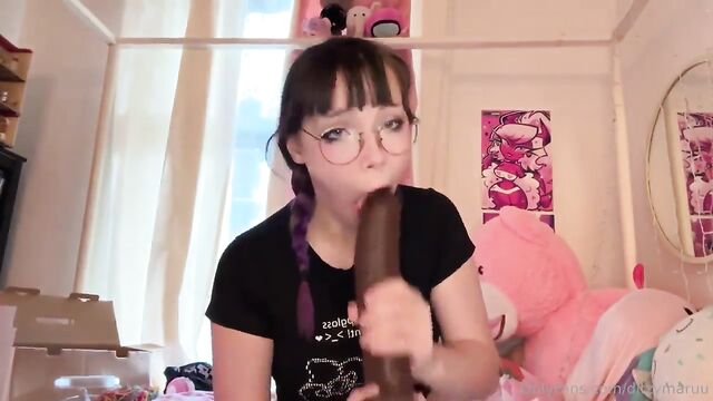 Goth slut uses a big dildo to practice before getting BBC