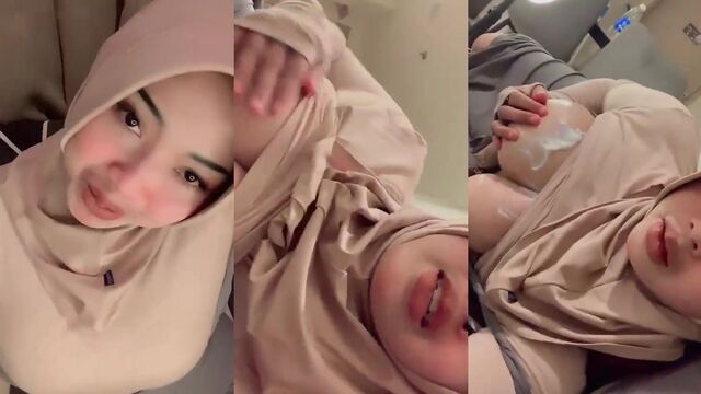 Hijabi woman caresses her big tits and gets fingered by a guy