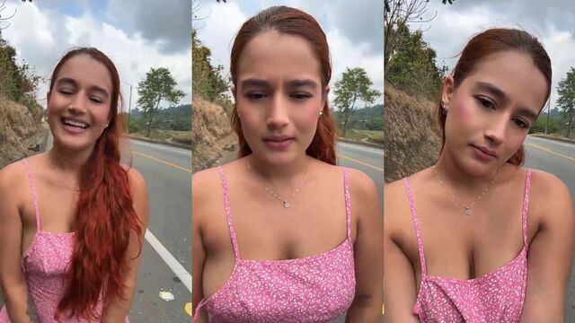 A cute girl has sex on the side of the road with a guy