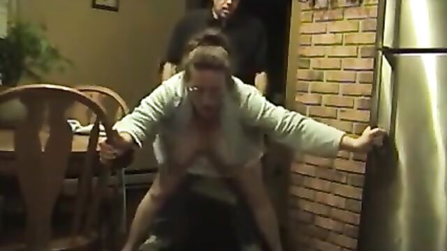 A mature woman was savagely fucked in the kitchen by a strong man