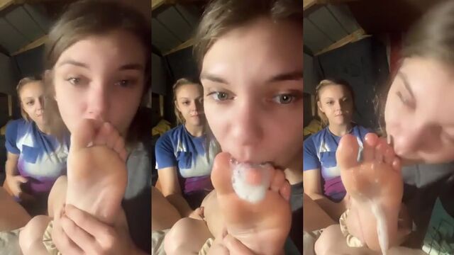 Two lesbians have a foot-fetish party, worshipping each other’s feet with spit