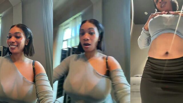Black babe with big tits flashing in public, a daring act!