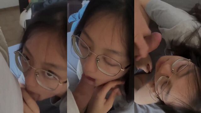 Nerdy Asian teen with glasses gets her throat full of cock