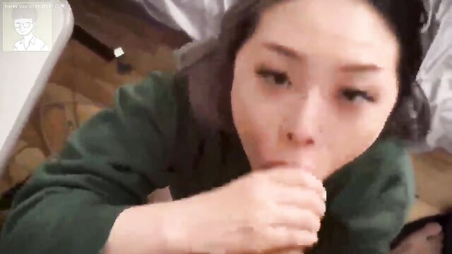 Another Asian girl gives a blowjob in the wood, on a cock