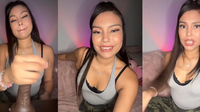 A cute petite Asian girl is teasing in the bathtub