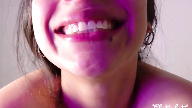 The goth girl is spitting on her lover’s face and licking it
